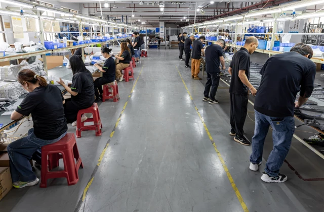 Full production line of solar street lights at Queneng factory with quality inspection walkthrough