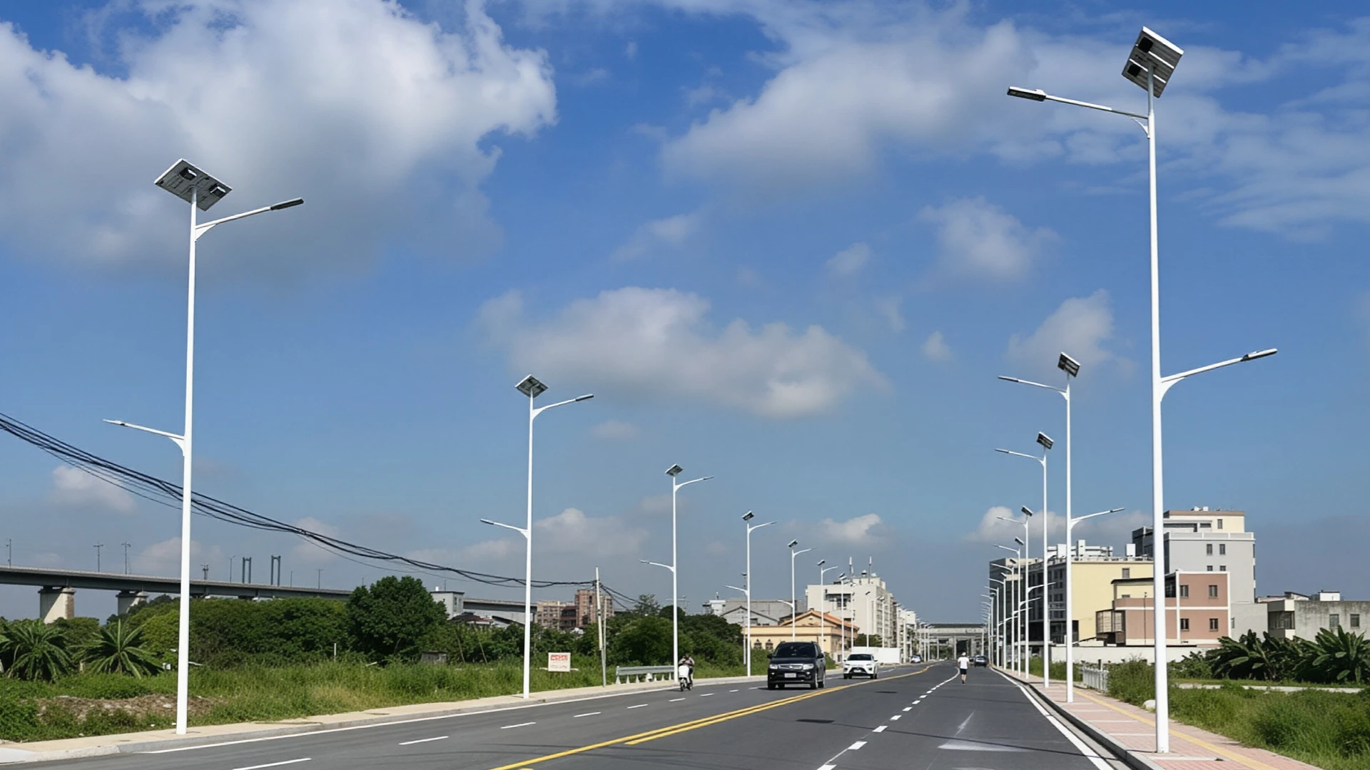 Solar street lighting infrastructure project with integrated LED solar street lights installed on roadway in Uganda